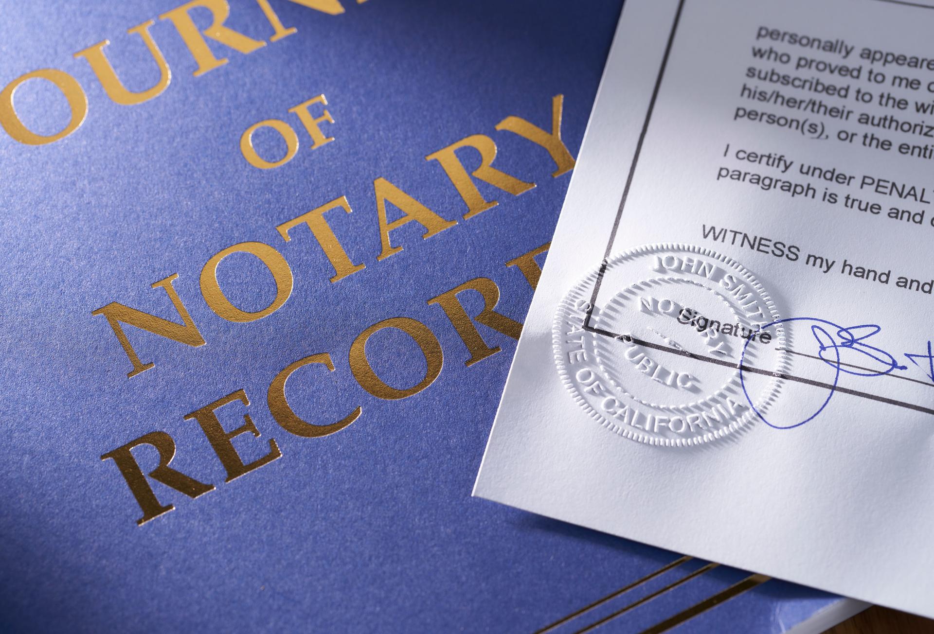 Notary Public: Seal embossed on document with journal